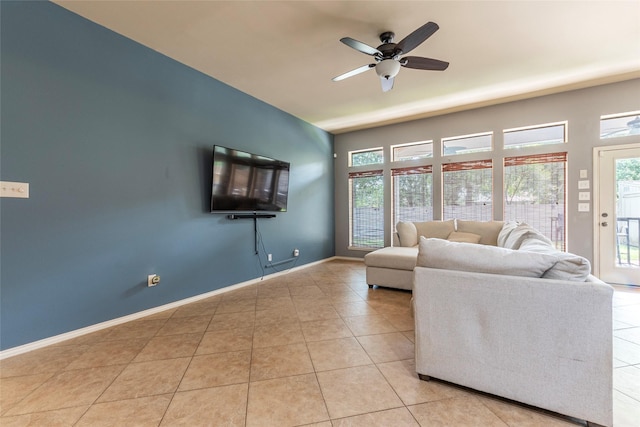 3211 Rock Brook Falls Ln, League City, TX 77573 - living room featuring a ceiling fan, plenty of natural light, and light tile patterned floors