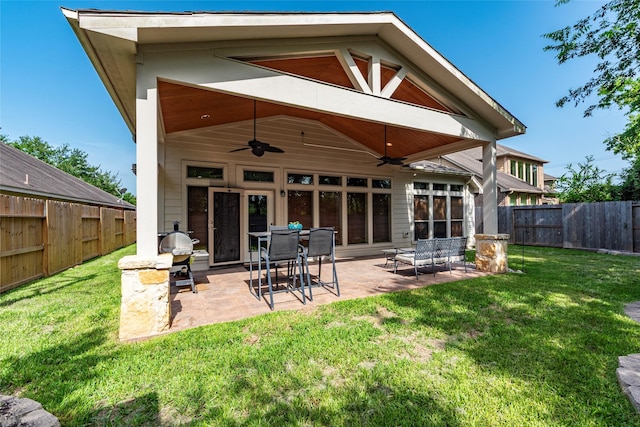 3211 Rock Brook Falls Ln, League City, TX 77573 - rear view of house featuring ceiling fan, a fenced backyard, and a patio