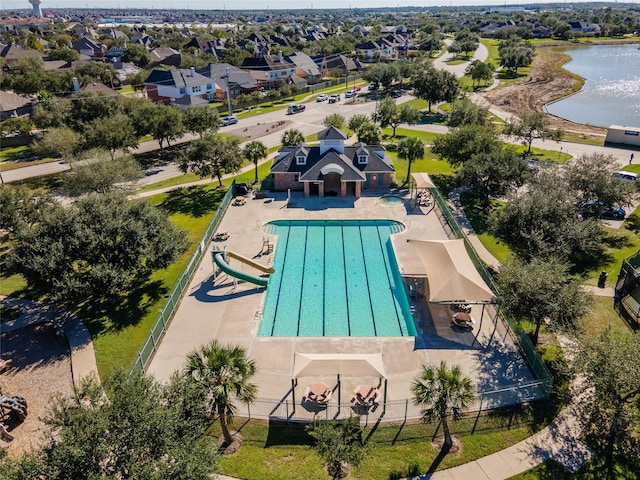 3211 Rock Brook Falls Ln, League City, TX 77573 - aerial view of residential area with a large body of water and a pool area