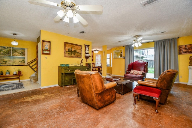 17010 Kings Walk Ln, Houston, TX 77070 - living area with a ceiling fan, a textured ceiling, and stairs