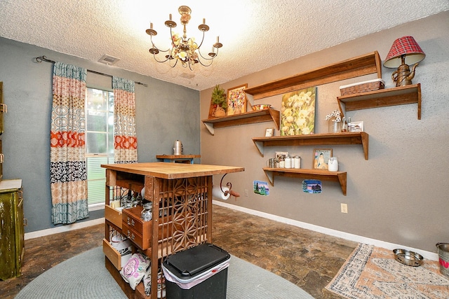 17010 Kings Walk Ln, Houston, TX 77070 - bar with a textured ceiling and a chandelier