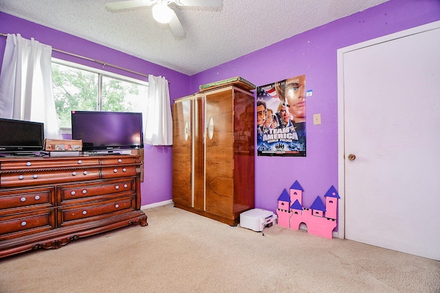 17010 Kings Walk Ln, Houston, TX 77070 - carpeted bedroom with a textured ceiling and ceiling fan
