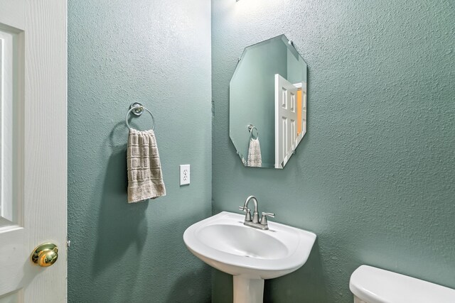 20907 Divellec Ln, Spring, TX 77388 - bathroom featuring toilet and a sink