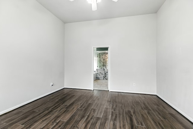 20907 Divellec Ln, Spring, TX 77388 - empty room with a ceiling fan and dark wood-type flooring