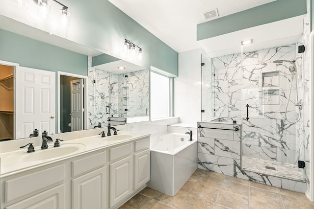 20907 Divellec Ln, Spring, TX 77388 - full bathroom featuring a marble finish shower, a bath, and double vanity