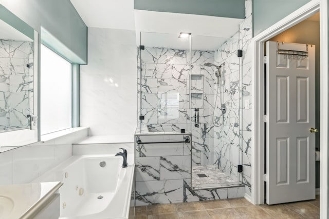 20907 Divellec Ln, Spring, TX 77388 - bathroom featuring a jetted tub, a marble finish shower, and vanity