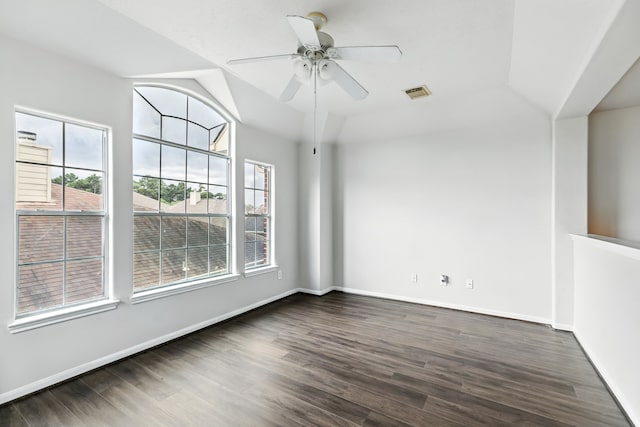 20907 Divellec Ln, Spring, TX 77388 - spare room featuring dark wood finished floors, vaulted ceiling, and ceiling fan