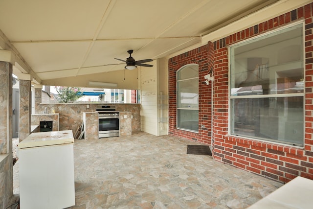 20907 Divellec Ln, Spring, TX 77388 - view of patio / terrace featuring exterior kitchen and ceiling fan