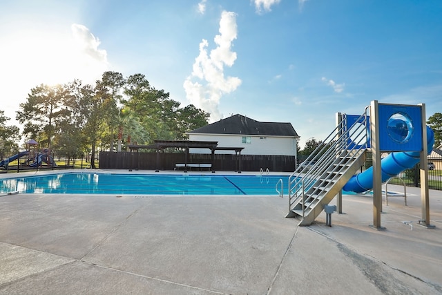 20907 Divellec Ln, Spring, TX 77388 - community pool with a patio area