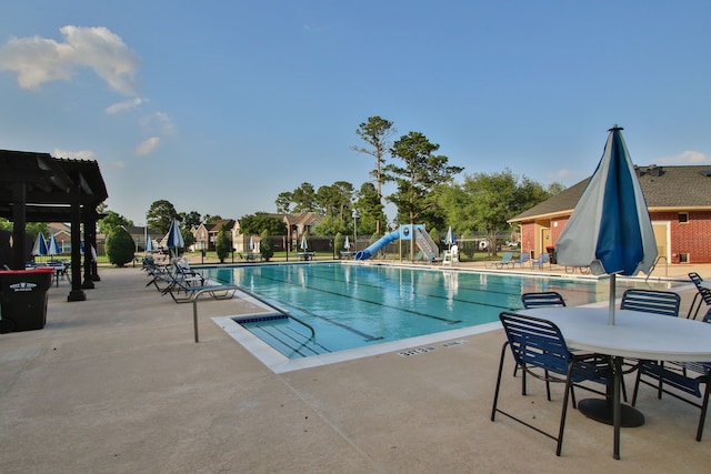 20907 Divellec Ln, Spring, TX 77388 - community pool featuring a patio and a water slide