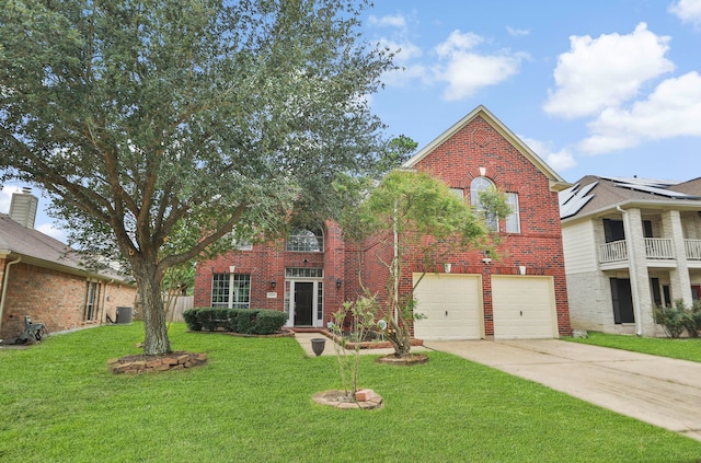 20907 Divellec Ln, Spring, TX 77388 - view of front of house with brick siding, driveway, an attached garage, and a front lawn