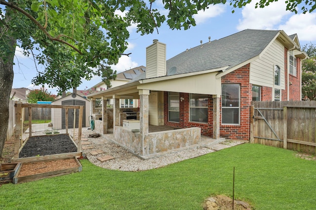 20907 Divellec Ln, Spring, TX 77388 - rear view of property with brick siding, a fenced backyard, a patio, and a shed
