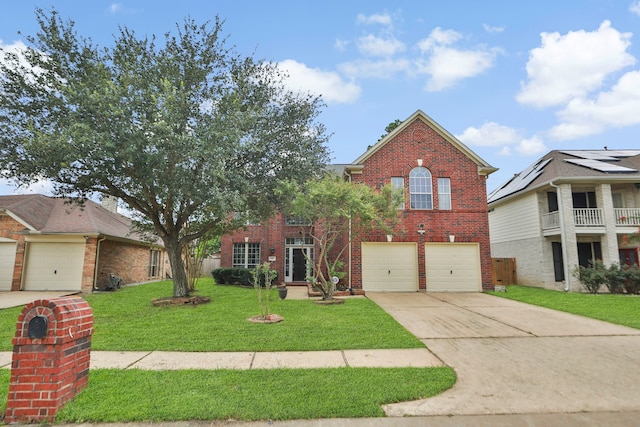 20907 Divellec Ln, Spring, TX 77388 - view of front of house featuring brick siding, a front lawn, concrete driveway, and an attached garage