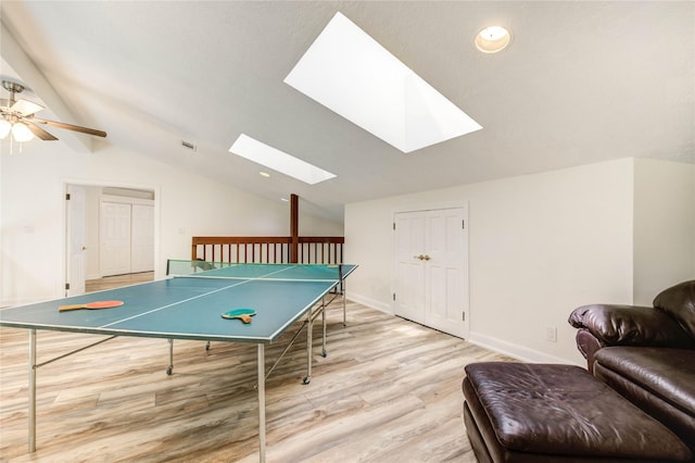 6606 Williams School Ct, Needville, TX 77461 - playroom featuring a skylight, lofted ceiling, light wood-style floors, and a ceiling fan