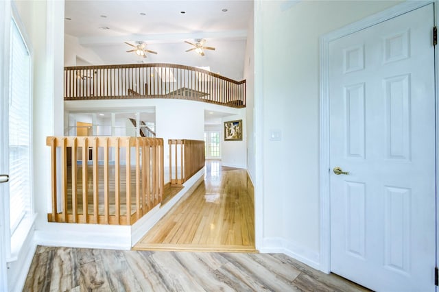 6606 Williams School Ct, Needville, TX 77461 - staircase with wood finished floors, ceiling fan, and lofted ceiling