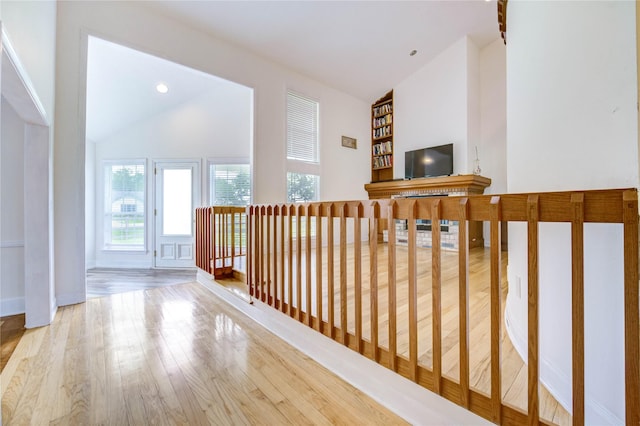 6606 Williams School Ct, Needville, TX 77461 - corridor featuring vaulted ceiling and wood finished floors