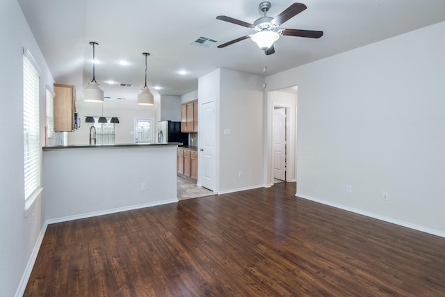 14039 Embry Stone Ln, Houston, TX 77047 - unfurnished living room with wood finished floors and ceiling fan