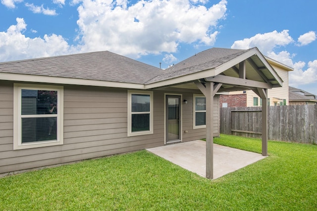 14039 Embry Stone Ln, Houston, TX 77047 - back of property with a patio and a shingled roof