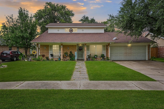 14018 Duncannon Dr, Houston, TX 77015 - view of front facade featuring an attached garage, concrete driveway, brick siding, roof with shingles, and a porch