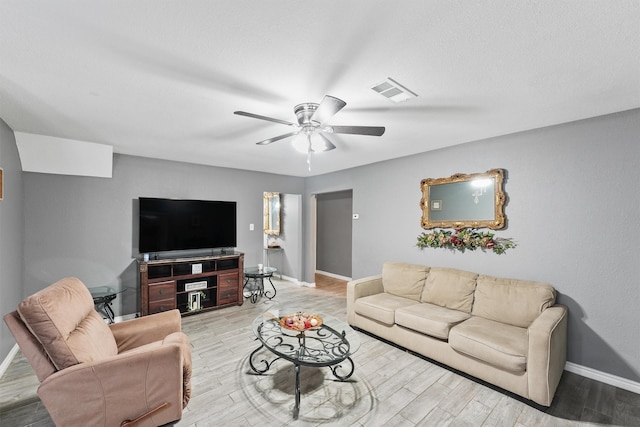14018 Duncannon Dr, Houston, TX 77015 - living room featuring light wood-style flooring and a ceiling fan