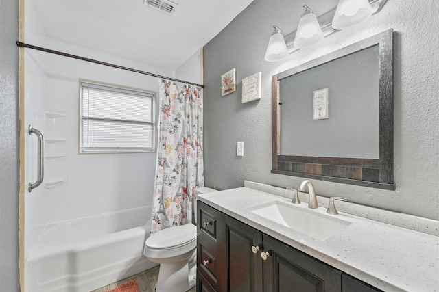 14018 Duncannon Dr, Houston, TX 77015 - bathroom featuring vanity, shower / tub combo, and a textured wall