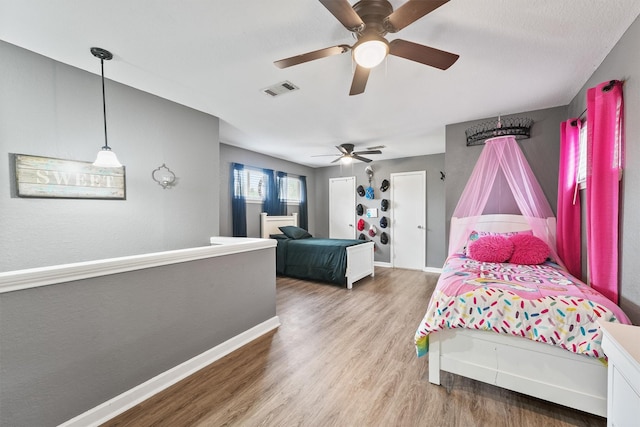 14018 Duncannon Dr, Houston, TX 77015 - bedroom featuring wood finished floors and ceiling fan
