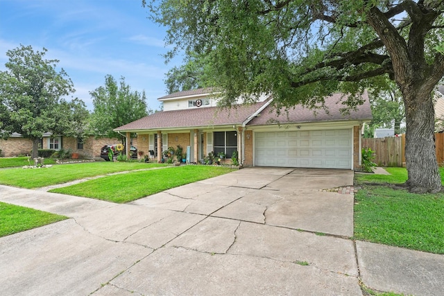 14018 Duncannon Dr, Houston, TX 77015 - traditional-style home with brick siding, driveway, and an attached garage