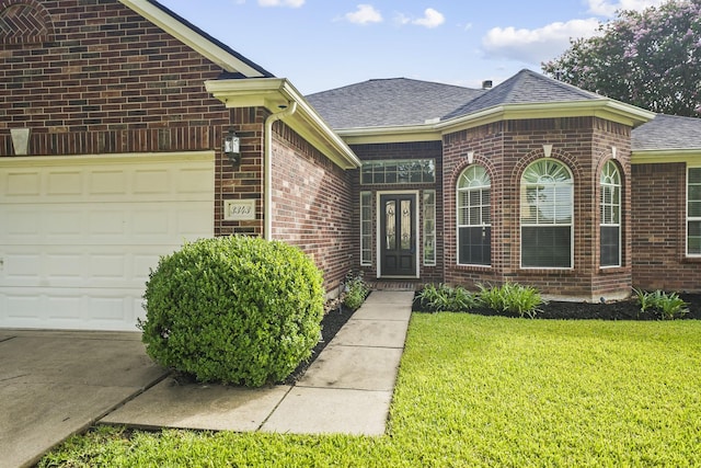 3343 Summerwood Ln, Pearland, TX 77584 - view of front facade with brick siding, an attached garage, roof with shingles, and a front lawn