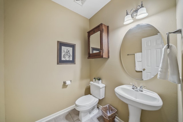 3343 Summerwood Ln, Pearland, TX 77584 - bathroom featuring tile patterned floors and toilet