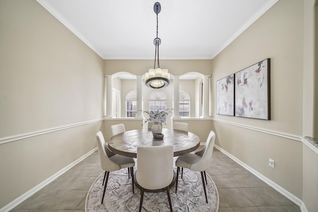 3343 Summerwood Ln, Pearland, TX 77584 - tiled dining area featuring ornamental molding, decorative columns, and a chandelier