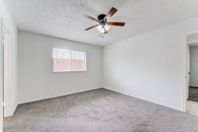 6306 Clayridge Dr, Houston, TX 77053 - carpeted spare room featuring a ceiling fan and a textured ceiling