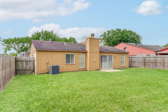 6306 Clayridge Dr, Houston, TX 77053 - rear view of property with a chimney and a fenced backyard