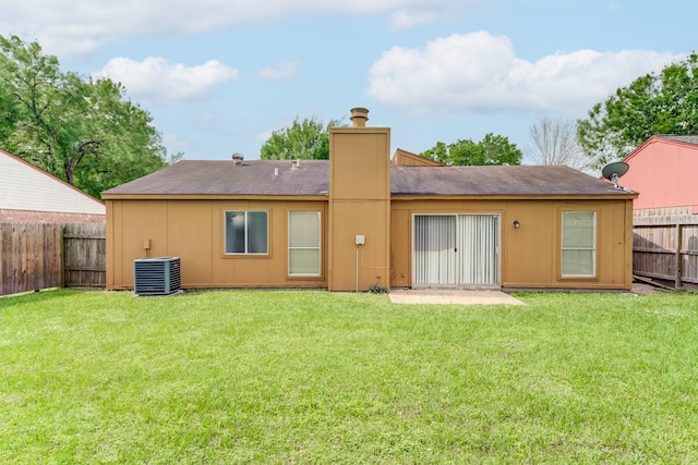 6306 Clayridge Dr, Houston, TX 77053 - back of property with a fenced backyard and a chimney