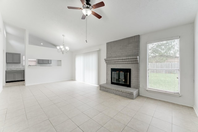 6306 Clayridge Dr, Houston, TX 77053 - unfurnished living room with lofted ceiling, a chandelier, plenty of natural light, ceiling fan, and light tile patterned floors