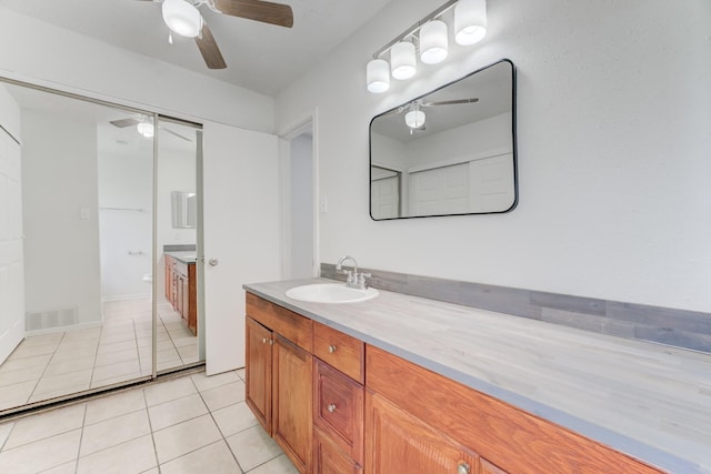 6306 Clayridge Dr, Houston, TX 77053 - full bath with a ceiling fan, vanity, and tile patterned flooring