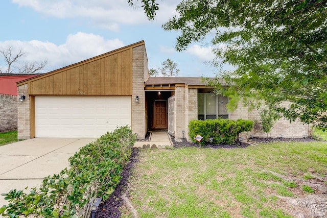 6306 Clayridge Dr, Houston, TX 77053 - mid-century inspired home with a garage, concrete driveway, brick siding, and a front lawn