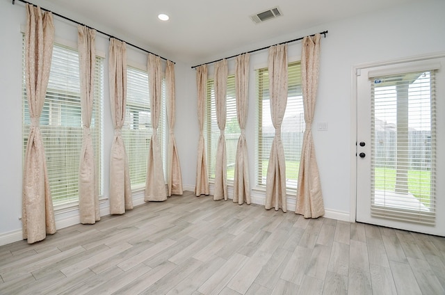 3707 Brampton Island Dr, Katy, TX 77494 - spare room with plenty of natural light, light wood-type flooring, and recessed lighting
