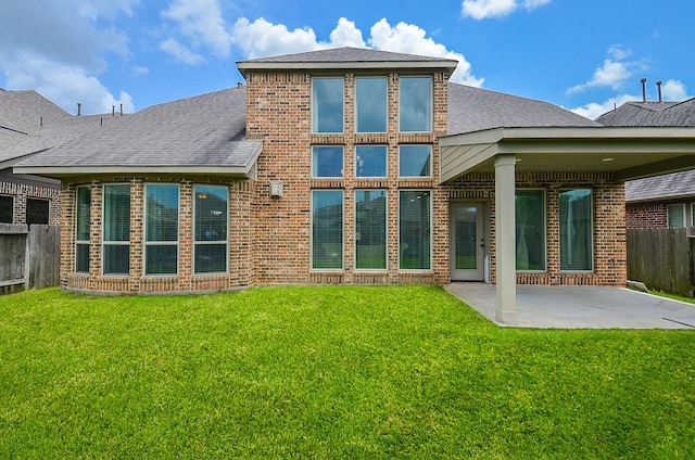 3707 Brampton Island Dr, Katy, TX 77494 - rear view of property with a patio area, a shingled roof, and brick siding