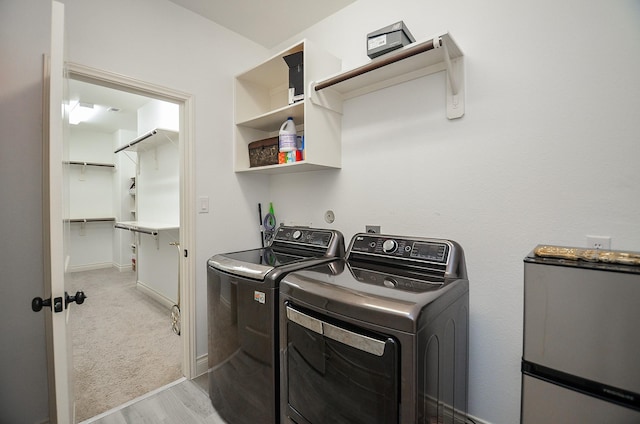 3707 Brampton Island Dr, Katy, TX 77494 - washroom featuring washer and dryer and light wood-type flooring