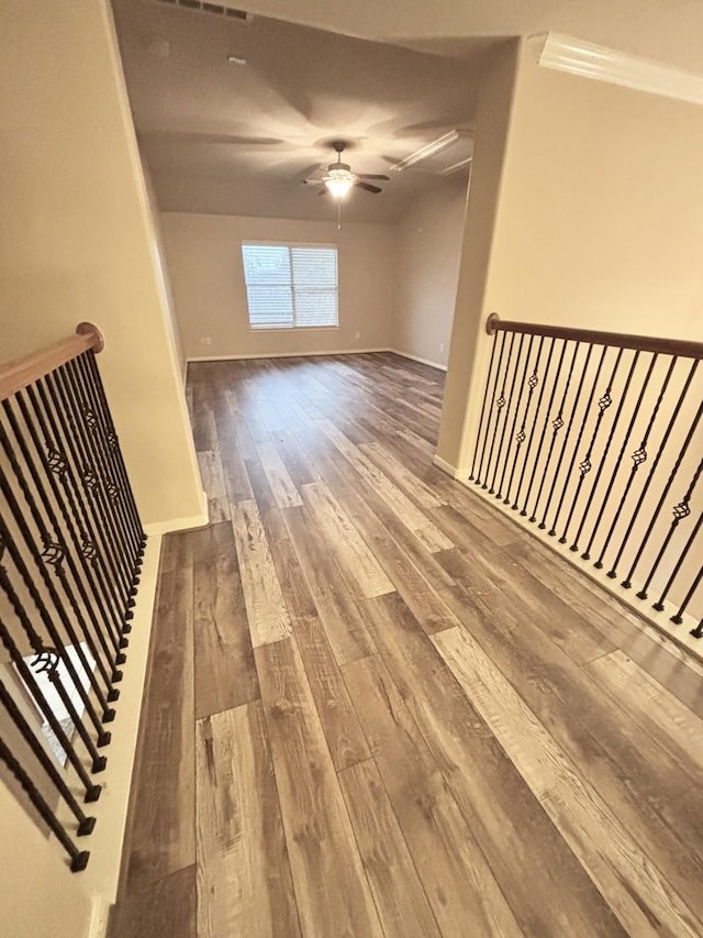 24514 Lake Path Cir, Katy, TX 77493 - empty room featuring hardwood / wood-style floors, ceiling fan, and ornamental molding