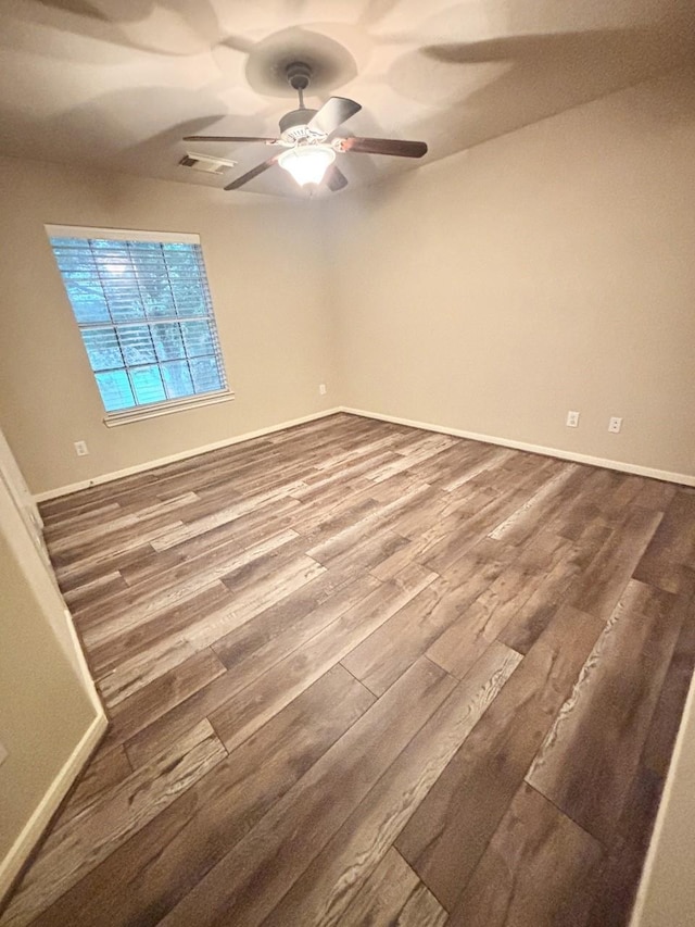 24514 Lake Path Cir, Katy, TX 77493 - empty room featuring ceiling fan and dark wood-style flooring