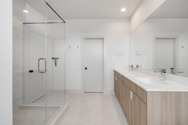4402 Santorini Ln, Houston, TX 77045 - bathroom with double vanity, a shower stall, and tile patterned flooring