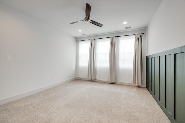 4402 Santorini Ln, Houston, TX 77045 - spare room with a ceiling fan, healthy amount of natural light, light carpet, and recessed lighting