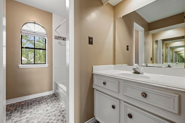 5802 Ashmere Ln, Spring, TX 77379 - bathroom featuring vanity and tub / shower combination