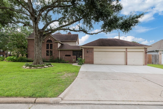 5802 Ashmere Ln, Spring, TX 77379 - traditional home with brick siding, driveway, a chimney, and a garage