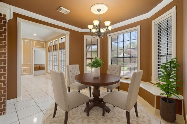 5802 Ashmere Ln, Spring, TX 77379 - dining area featuring a chandelier, light tile patterned flooring, and ornamental molding