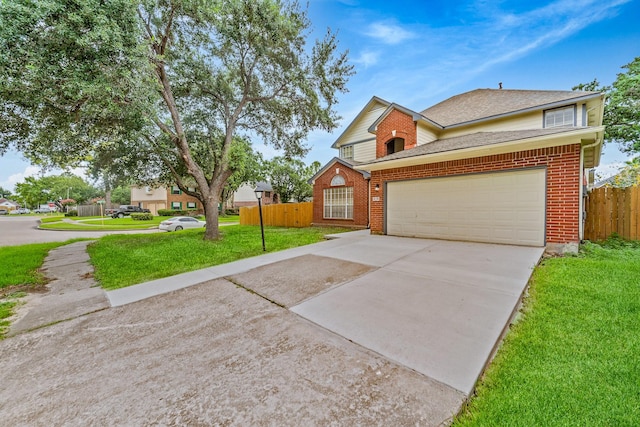 13611 Ortega Ln, Houston, TX 77083 - traditional home with concrete driveway, brick siding, an attached garage, and roof with shingles