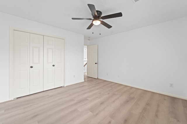13611 Ortega Ln, Houston, TX 77083 - unfurnished bedroom featuring light wood-style flooring, a closet, and ceiling fan