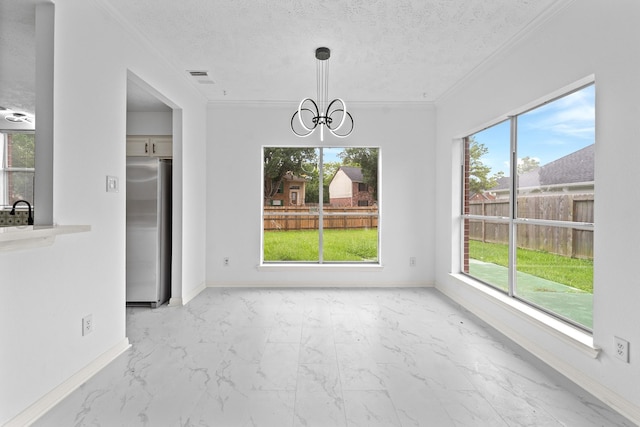 13611 Ortega Ln, Houston, TX 77083 - unfurnished dining area featuring ornamental molding, light marble finish flooring, healthy amount of natural light, a chandelier, and a textured ceiling