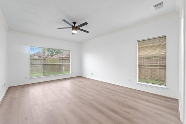 13611 Ortega Ln, Houston, TX 77083 - empty room with crown molding, wood finished floors, and a ceiling fan